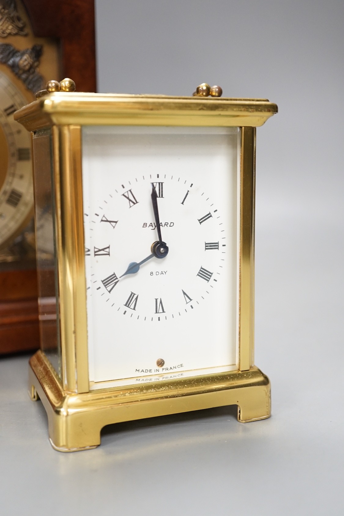 A burr walnut Elliott clock and a Duverdrey & Bloquel carriage timepiece (2)